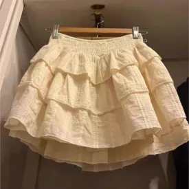 TAVIMART  -  Ruffle A-line Sweet Short Skirts Elastic Waist Women Summer Skirt Hollow Out Embroidery Beige Casual Skirt Academic Style
